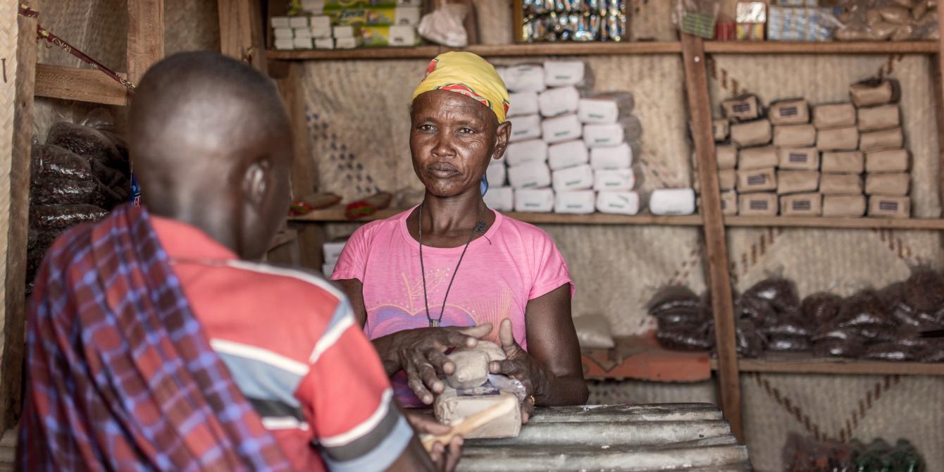 Helen Akuom at her shop in Kapua, Turkana County Kenya. Photo Credit: Joy Obuya Helen Akuom,50, at her shop in Kapua, Turkana County Kenya. Photo Credit: Joy Obuya